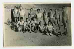 Cobblers in front of their tent-workshop