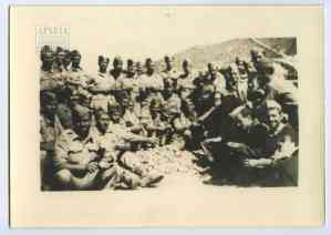 Peeling onions at the Third Battalion